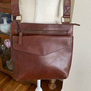Fat face leather crossbody